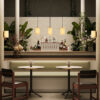 maris-3-light-linear-pendant-black-lifestyle Maris 3 light linear pendant with black frame and three textured warm-toned shades.