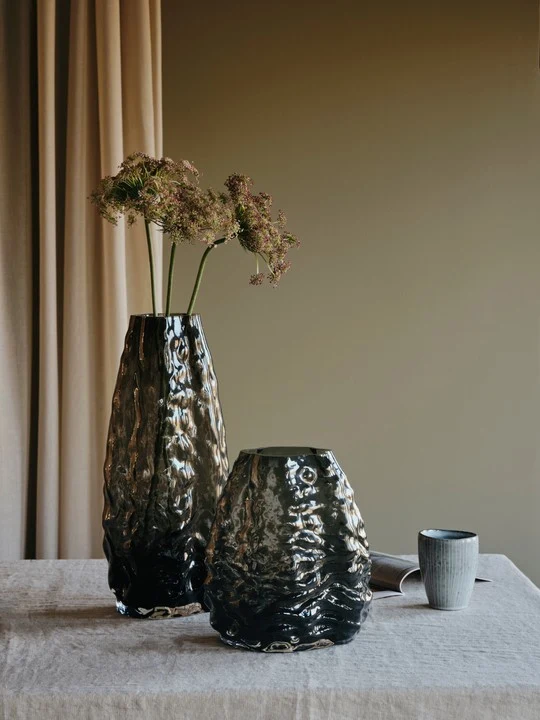 Milla Round Vase in grey mouthblown glass with a soft sculptural shape