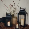 nilo-lantern-black-metal-glass-lifestyle Nilo Lantern in black metal and clear glass with a tall contemporary design