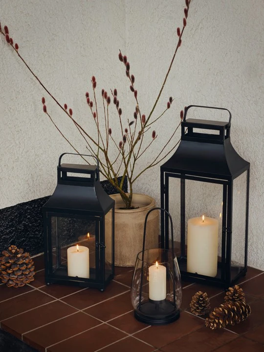 nilo-lantern-black-metal-glass-lifestyle Nilo Lantern in black metal and clear glass with a tall contemporary design