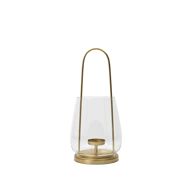 nilo-lantern-brass-metal-glass Nilo Lantern in brass-finish metal and clear glass with a tall contemporary design