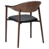 ravish-armchair-raven-black-walnut-veneer-legs-angled Ravish Armchair in Raven Black upholstery with curved walnut veneer back, integrated armrests and walnut legs.
