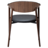 ravish-armchair-raven-black-walnut-veneer-legs-back Ravish Armchair in Raven Black upholstery with curved walnut veneer back, integrated armrests and walnut legs.