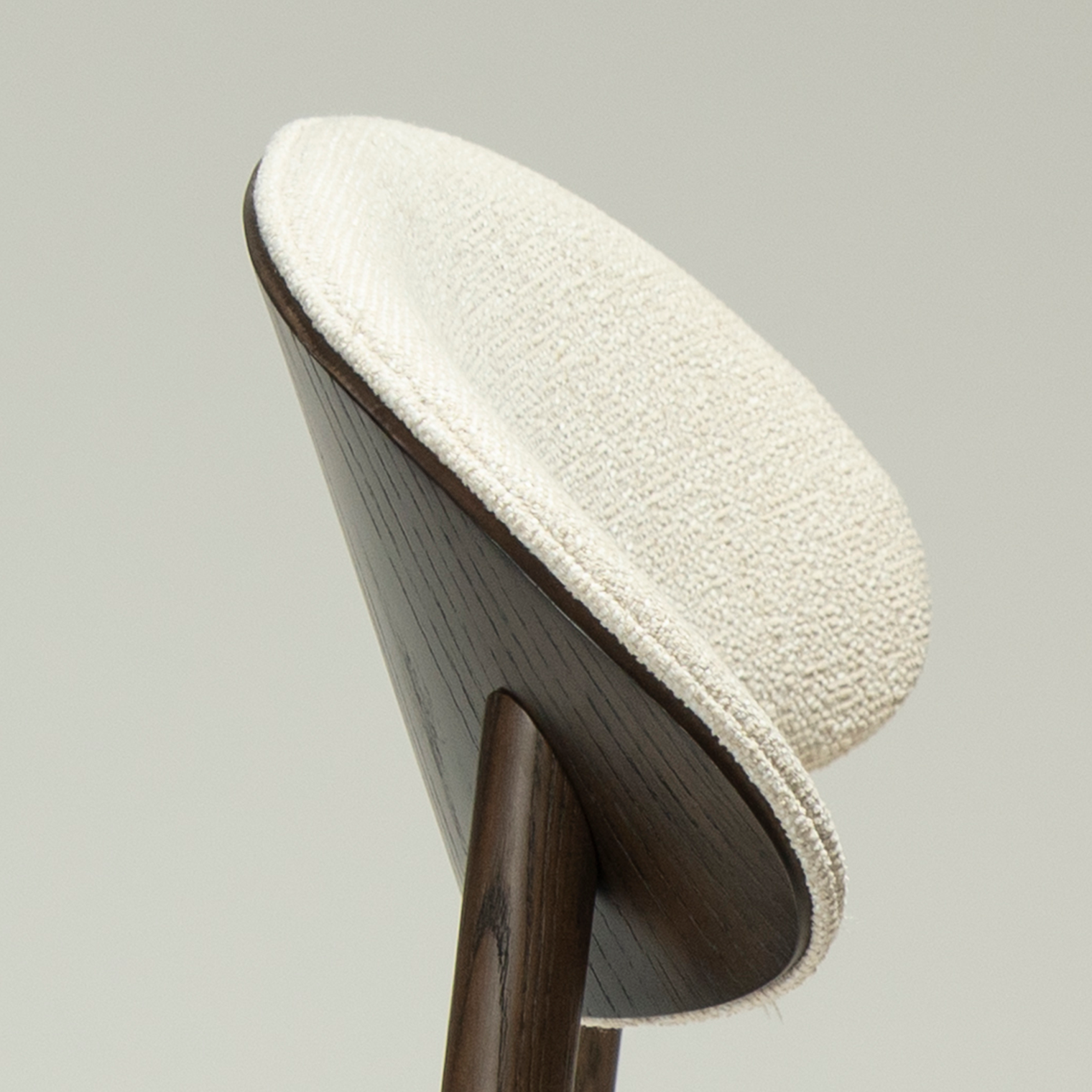 ravish-chair-simply-beige-mocca-stained-ash-veneer-back-rest Ravish dining chair in Simply Beige fabric with a curved mocca stained ash veneer back and matching timber legs.