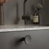 Terra matt black cast iron cabinet knob for kitchen cabinets, drawers, wardrobes, and bespoke furniture.