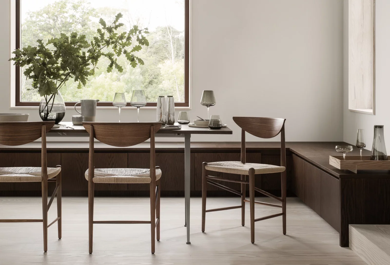 Belo Smoke drinking glasses displayed on a contemporary dining table