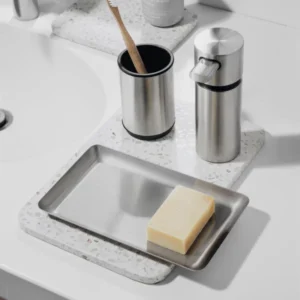 A stainlees steel tray for holding soap