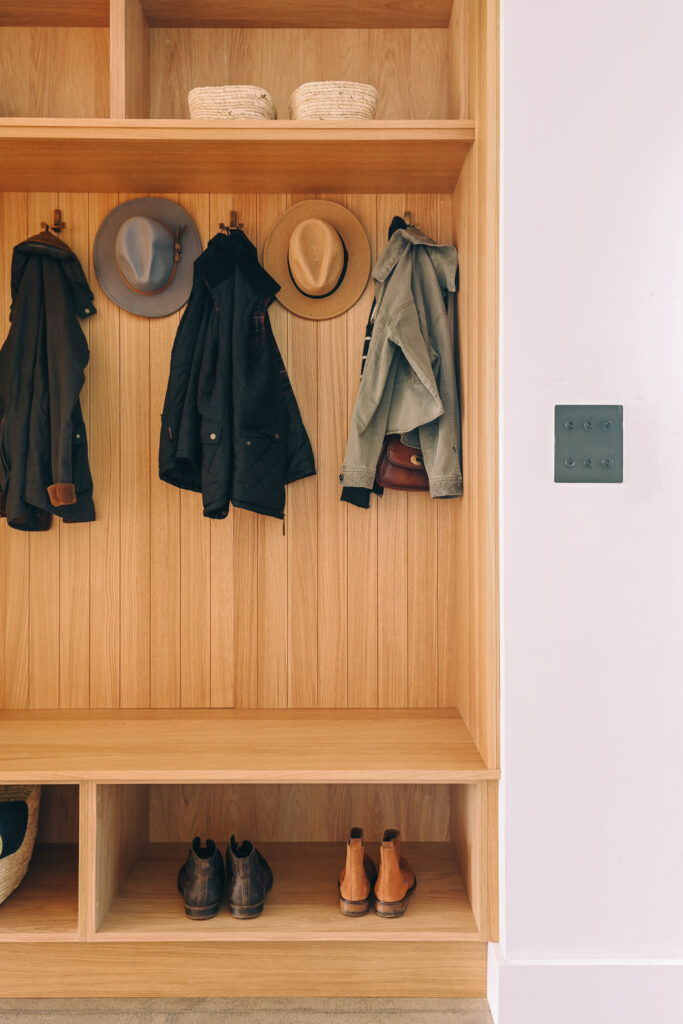 A bespoke oak hallway for coats and shoes.